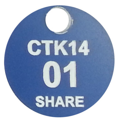 Blue traffolyte tag that has been laser engrave to let the white layer show though